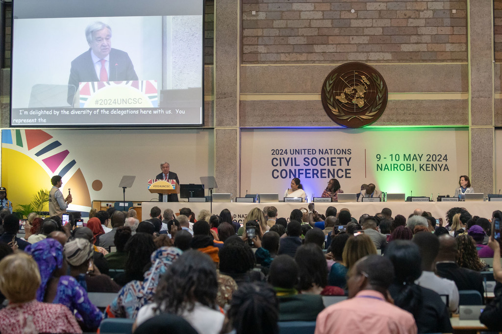 Secretary-General António Guterres (at podium) addresses the closing of the UN Civil Society Conference in Nairobi, Kenya.